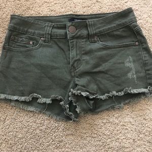 Green denim shorts